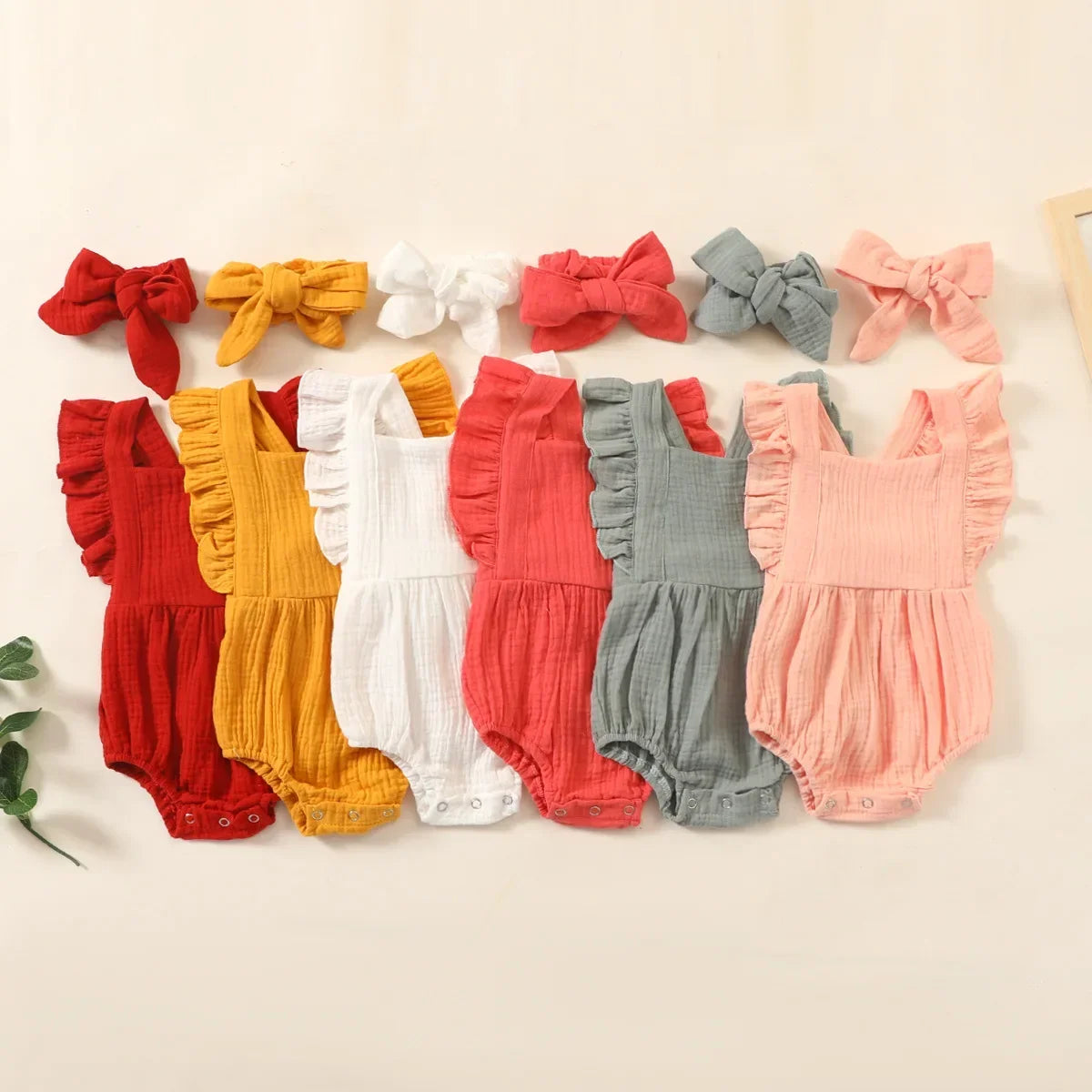 Frill sleeve muslin onepiece fashion baby clothing | See:Saw Kids